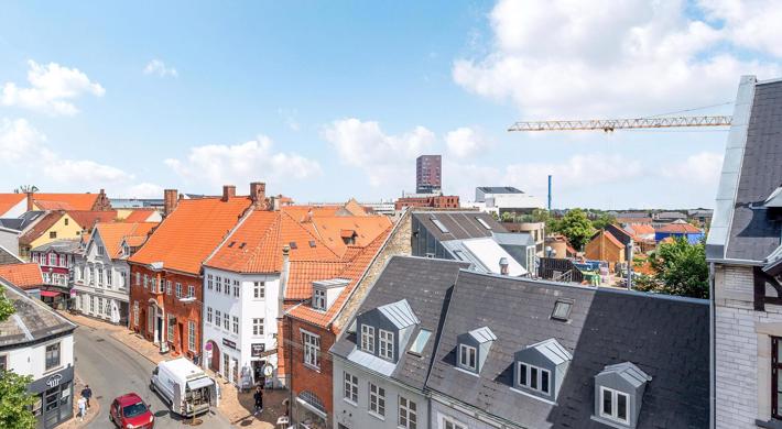 Lækker citylejlighed med stor fælles tagterasse med udsigt over byen